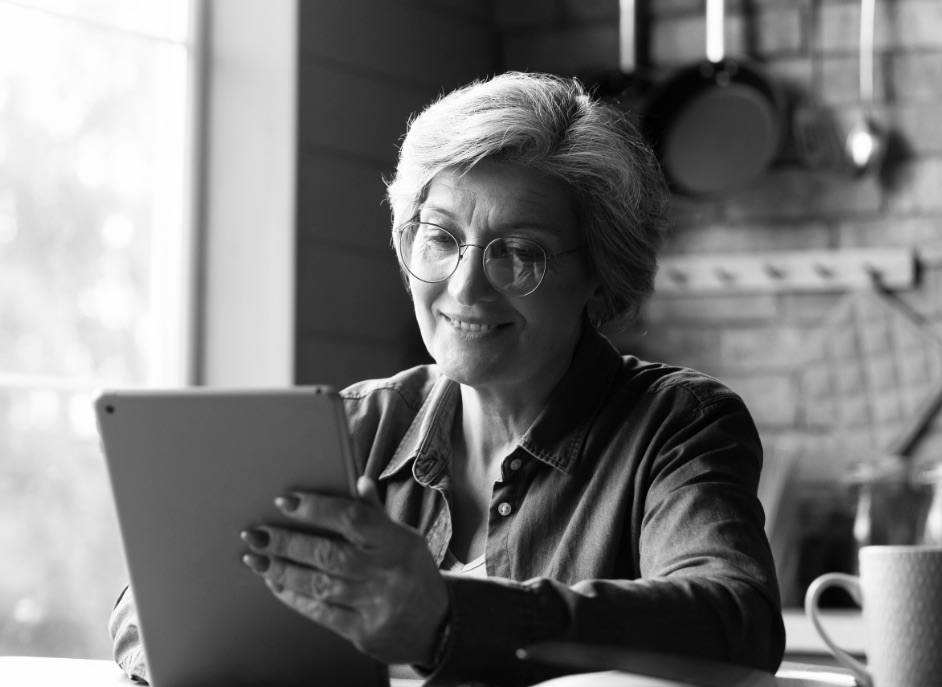 Mature woman holding ipad